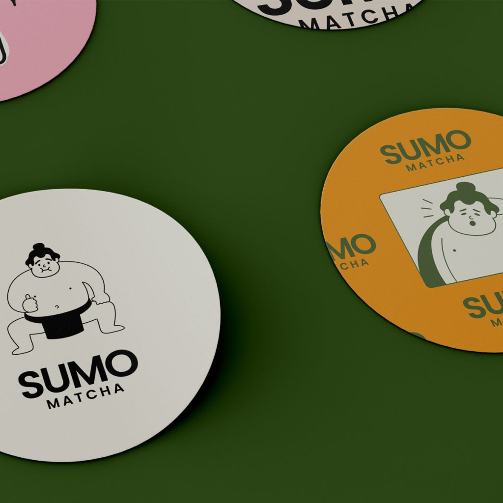 Sumo Matcha coasters on a green background